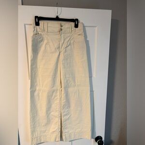 Stretchy thin cream/white pants. Not full length